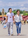 Couple on a sunny Tiananmen Square, Beijing, China